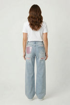 Jeans με ροζ τσέπη
